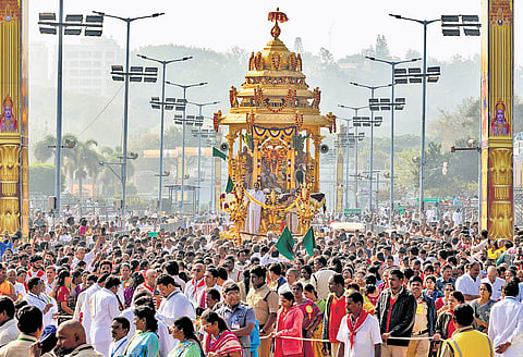 Lord Malayappa Swamy being taken out on the golden chariot as part of Vaikunta Ekadasi celebrations at Tirumala 