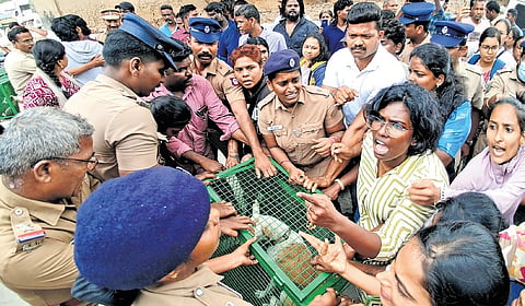 Activists arguing with police and corporation staff on HC premises.