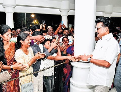 Chief Minister MK Stalin greeting the public after paying floral tributes at the memorials of Anna and Kalaignar
in Chennai on Thursday 