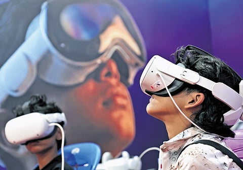 Children check out Virtual Reality show at the fest held at Government College, Thiruvananthapuram 