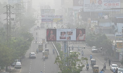 A thick layer of fog envelops at Karimnagar on Friday. 