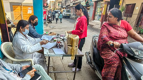 Medicines being distributed at a camp after several people were affected due to consumption of contaminated water at Bhagirathpura area, in Indore, Madhya Pradesh, Wednesday, Dec. 31, 2025.