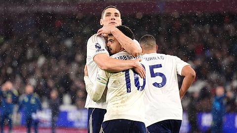 Nottingham Forest's Morgan Gibbs-White, center, celebrates scoring during the English Premier League soccer match between West Ham United and Nottingham Forest in London, Tuesday Jan. 6, 2026. 