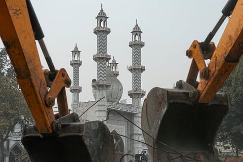 Debris being removed from the site during an anti-encroachment drive carried out by Municipal Corporation of Delhi (MCD) near the Faiz-e-Elahi mosque in Ramlila Maidan area, in New Delhi, Wednesday, Jan. 7, 2026.