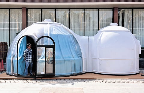 Polycarbonate dome houses and miniature models of Amaravati buildings 