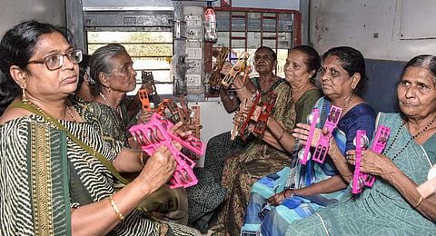 Pilgrims aboard a train for Somnath Temple as the four-day-long 'Somnath Swabhiman Parva' begins, in Surat, Gujarat, Thursday, Jan. 8, 2025. 