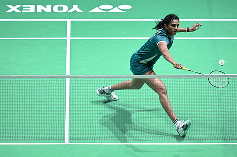 India's PV Sindhu plays a point during her women's singles semi-final match against China's Wang Zhi Yi at the Malaysia Open badminton tournament in Kuala Lumpur on January 10, 2026. 