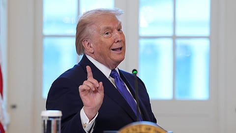 President Donald Trump talks about the White House ballroom construction as he arrives to speak during a meeting with oil executives in the East Room of the White House, Friday, Jan. 9, 2026, in Washington