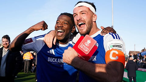 Macclesfield FC goalscorers Paul Dawson, right and Isaac Buckley-Ricketts celebrate following the FA Cup third round soccer match between Macclesfield Town and Crystal Palace, at the Leasing.com Stadium, Macclesfield, England, Saturday, Jan. 10, 2026. 