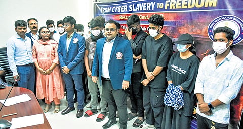 AP CID SP Adhiraj Singh Rana interacting with the victims of the State trapped in Myanmar cyber slavery during the press conference in Mangalagiri.