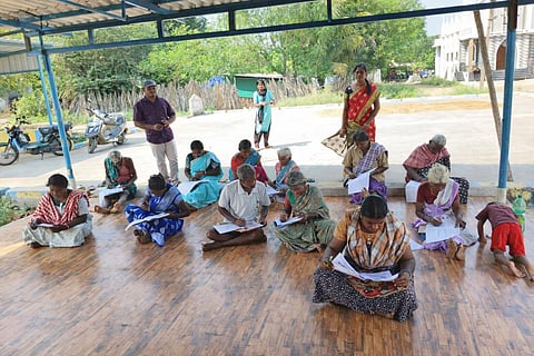 Officials say the New India Literacy Programme has helped many women to read newspapers, bus destination boards and manage simple financial transactions.