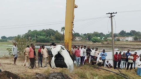  In a rescue operation car parts retrieved from the farm well at Veldi village in Manakondur mandal in Karimnagar district on Monday.