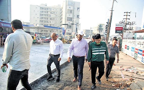 GBA Chief Commissioner Maheshwar Rao, along with officials,  inspects 
white-topping work on Hennur-Bagalur Road on Wednesday 