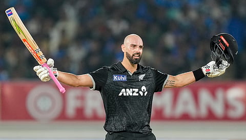 Daryl Mitchell celebrates his century on Wednesday