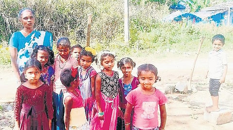 Vijayalakshmi with her students at the single teacher school at Edalipara 