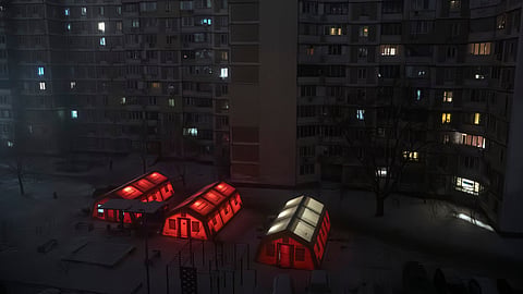 Emergency tents are set up in a residential neighbourhood where people can warm up following Russia's regular air attacks