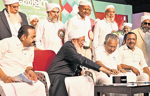 Chief Minister Pinarayi Vijayan and Kanthapuram A P Aboobacker Musliyar launching Rifayi, Kerala Muslim Jamaath’s financial assistance scheme for children with autism and cerebral palsy, at the valedictory of the Kerala Yathra led by Kanthapuram, in Thiruvananthapuram on Friday. Leader of Opposition 
V D Satheesan and Karnataka assembly Speaker U T Khader are also seen.