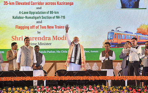 Modi with Assam Governor Lakshman Prasad Acharya, Union Minister Sarbananda Sonowal and Chief Minister Himanta Biswa Sarma during the foundation stone laying ceremony.