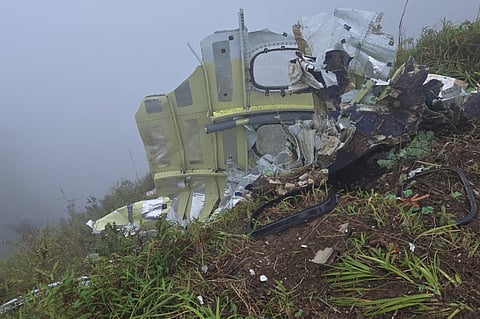 This photo provided by the Indonesian National Search and Rescue Agency (BASARNAS) shows debris of an ATR 42-500 turboprop airplane at Mount Bulusaraung in South Sulawesi province, Indonesia, Sunday, Jan. 18, 2026, after the aircraft lost contact Saturday.
