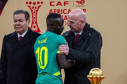 Senegal's forward #10 Sadio Mane speaks with FIFA President Gianni Infantino as Morocco's Prince Moulay Rachid looks on during presentation at the end of the Africa Cup of Nations (CAN) final between Senegal and Morocco (Photo | AFP)