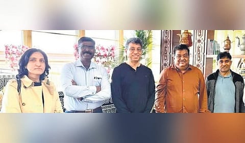 Industries Minister MB Patil with his delegation before leaving for Davos.