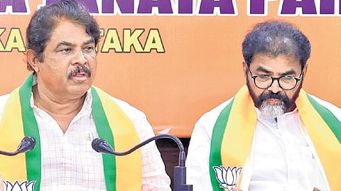 R Ashoka & Chalavadi Narayanaswamy address the media. 