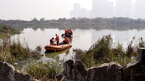 National Disaster Response Force (NDRF) team commences operations in a water-filled pit at a construction site following the death of a 27-year-old engineer who drowned there, in Noida, Tuesday, Jan. 20, 2026.