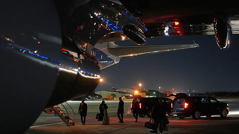 Things are unloaded from Air Force One after the plane, carrying President Donald Trump to the World Economic Form in Davos, experienced a minor electrical issue after departure, Tuesday, Jan. 20, 2026, and returned to Joint Base Andrews, Md. Trump will board a second plane to complete the trip. 