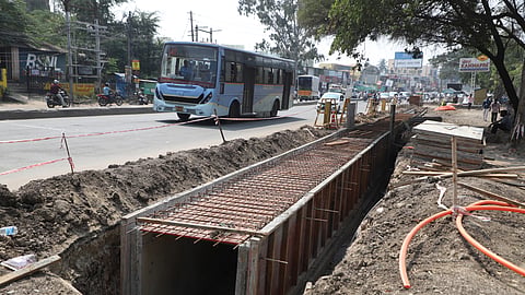 Activists flag safety concerns over stormwater drains built along existing Sathy Road carriageway despite sanctioned widening works seeing little progress.