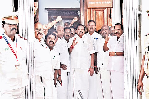 AIADMK MLAs, led by general secretary Edappadi K Palaniswami, staging a walkout against the allegedly deteriorating L&O in TN 