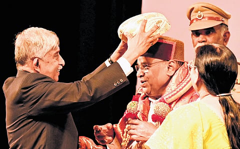 Governor Thaawarchand Gehlot being felicitated by former Rajya Sabha member K C Ramamurthy at a programme in Bengaluru on Wednesday 