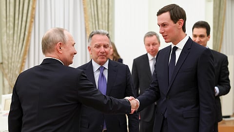 Russian President Vladimir Putin, left, greets US President Donald Trump's envoys Steve Witkoff, center, and Jared Kushner at the Senate Palace of the Kremlin, in Moscow, Thursday, Jan. 22, 2026.