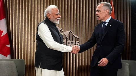 India's Prime Minister Narendra Modi and Canada's Prime Minister Mark Carney 