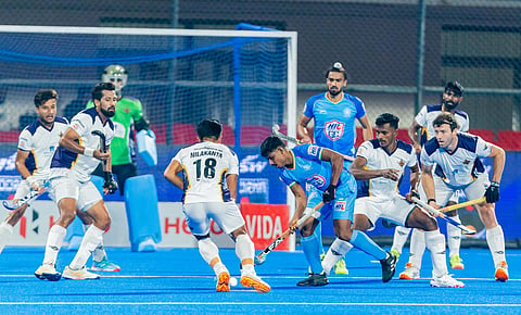Action during the match between Hyderabad Toofans and HIL GC on Monday