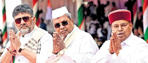 Deputy Chief Minister DK Shivakumar, Chief Minister Siddaramaiah, and 
Governor Thaawarchand Gehlot attend the 77th Republic Day celebrations at Field Marshal Sam Manekshaw Parade Ground in Bengaluru on Monday 