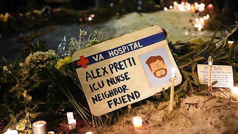 A sign for 37-year-old Alex Pretti, who was fatally shot by a US Border Patrol officer earlier in the day, is displayed during a vigil Saturday, Jan. 24, 2026, in Minneapolis.