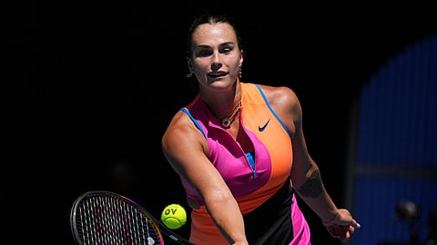 Aryna Sabalenka of Belarus plays a forehand return to Iva Jovic of the U.S. during their quarterfinal match at the Australian Open tennis championship in Melbourne, Australia, Tuesday, Jan. 27, 2026. 