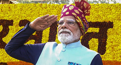 In this screengrab from a video posted on Jan. 26, 2026, Prime Minister Narendra Modi takes salute during the 77th Republic Parade, at Kartavya Path, in New Delhi. 