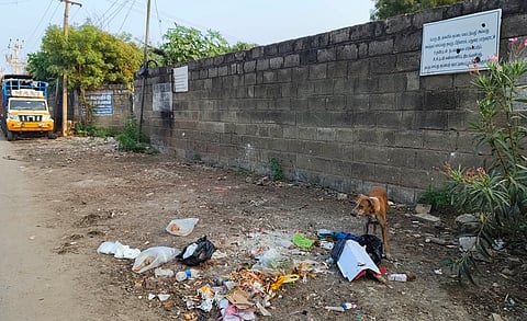 Corporation placed announcement boards to prevent open dumping of waste in city. 