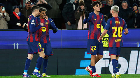 Barcelona's Lamine Yamal (second left) celebrates his side's second goal during the Champions League opening phase soccer match between Barcelona and Copenhagen on Wednesday, Jan. 28, 2026.