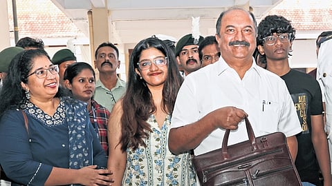 Finance Minister K N Balagopal arrives at the assembly to present the budget. Wife Asha Prabhakaran and children Kalyani and Govind are also seen 