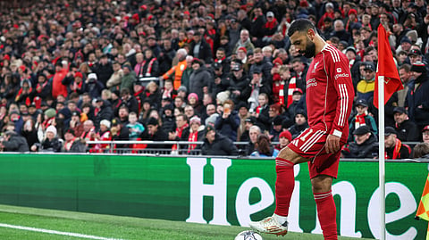 Liverpool's Mohamed Salah prepares to execute a corner kick during the Champions League soccer match between Liverpool and Qarabag in Liverpool, Wednesday, Jan. 28, 2026. 