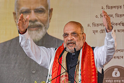  Union Home Minister Amit Shah addresses a public meeting, in Dibrugarh, Friday, Jan. 30, 2026. 