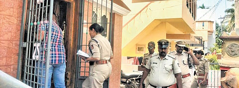 Police at the crime scene at Kotturu in Vijayanagara district