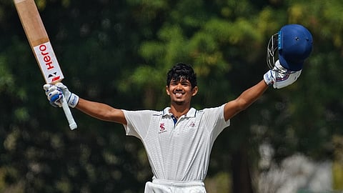 Vimal Khumar celebrates his ton on Saturday 