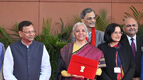 Union Finance Minister Nirmala Sitharaman with Union Minister of State for Finance Pankaj Chaudhary and other officials outside the Finance Ministry ahead of the presentation of the 'Union Budget 2026-27 at Ministry of Finance Kartavya Bhavan in New Delhi on Sunday, February 1.