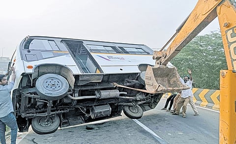 Two students were travelling in the school van that overturned on the Maduravoyal flyover. The accident caused heavy traffic congestion on the bypass 