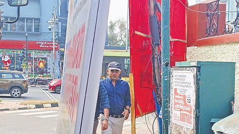 An illegal hoarding in front of Secretariat 