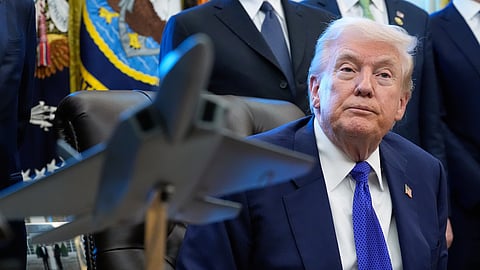 President Donald Trump listens to a question from a reporter as he speaks in the Oval Office of the White House, Monday, Feb. 2, 2026, in Washington. 