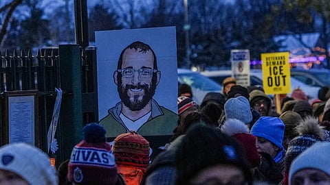 People attend a vigil for Alex Pretti, who was fatally shot by a federal agent, at the Minneapolis VA Hospital, where Pretti worked, on Sunday, Feb. 1, 2026, in Minneapolis. 